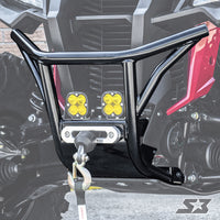 A close-up of the S3 Power Sports 2019+ Honda Talon Front Winch Bumper in black metal, featuring two square yellow LED lights and a winch hook, mounted on an off-road vehicle with visible headlights and red panels.