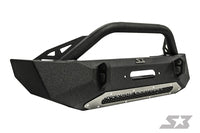 The S3 Power Sports 2007-2017 Jeep Wrangler JK Ambush Series Front Winch Bumper is matte black, heavy-duty, with a grille guard, winch mount, D-ring points, angular lines, LED light mount, silver skid plate, and Smittybilt & SX logos.