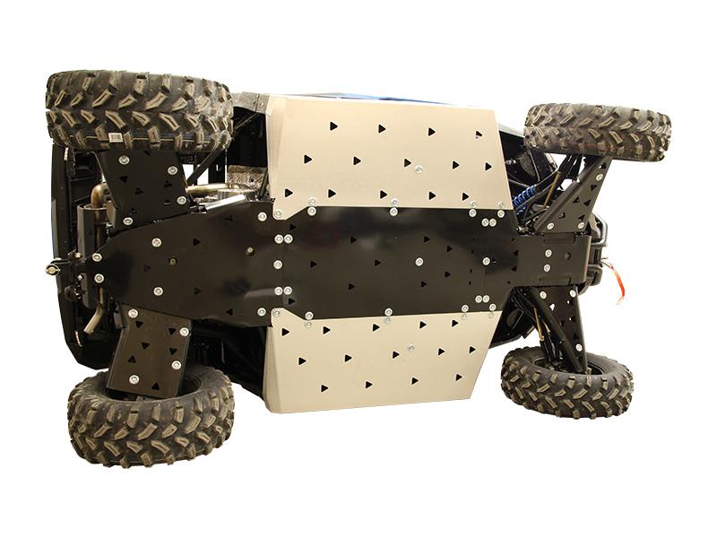 The Polaris General Skid Plate Full Set (Aluminium/Plastic) is shown installed under a rugged off-road vehicle, featuring triangular cutouts, visible bolted joints, and reinforced protection for the chassis with large knobby tires.
