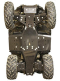 The image shows a Polaris Sportsman 570 SP (2021+) ATV flipped upside down, revealing its plastic skid plate full set and four large, muddy tires with a rugged suspension system.