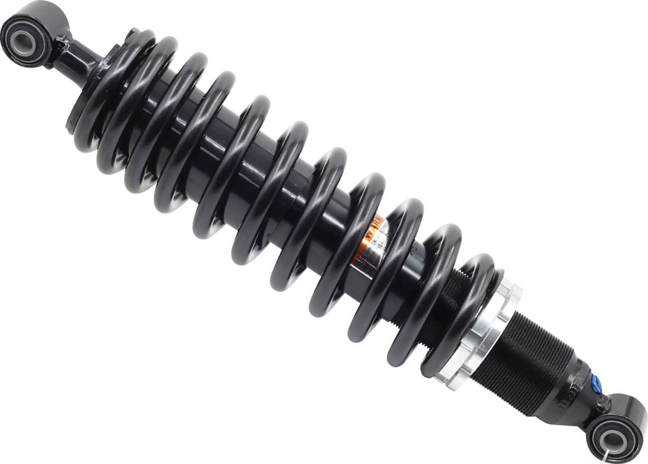 A black metal coil spring shock absorber with mounting eyelets at both ends; the coil is tightly wound around a cylindrical damper, which has adjustment rings and a small orange label, isolated on a white background.