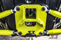 Close-up of the S3 Power Sports 2014+ Polaris Rzr Xp 1000 Hd 2 Hitch Receiver Plate in bright yellow, showing four connected rods, bolts, and a central square opening with visible gears. Mounted on black background with an “S” star logo bottom right.