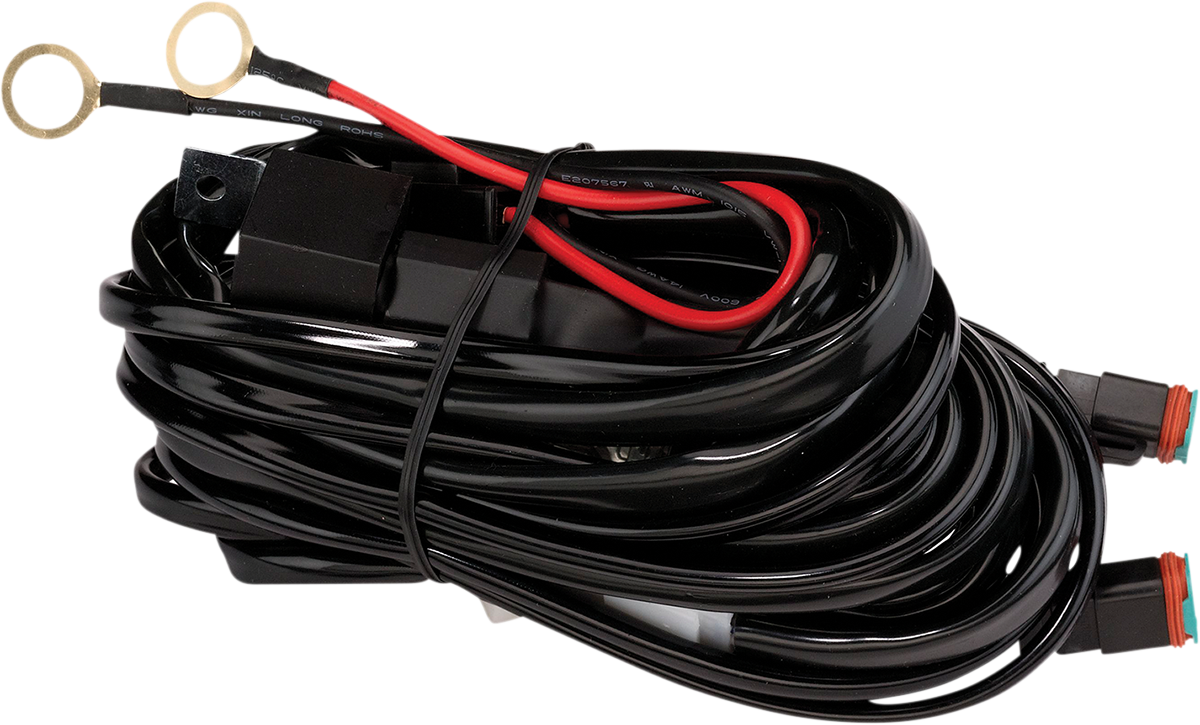A coiled black electrical wiring harness featuring two ring terminals on one end with red and black wires, and two rectangular connectors with orange seals on the other end. The wires are secured by a twist tie, and some plastic casing is visible within t