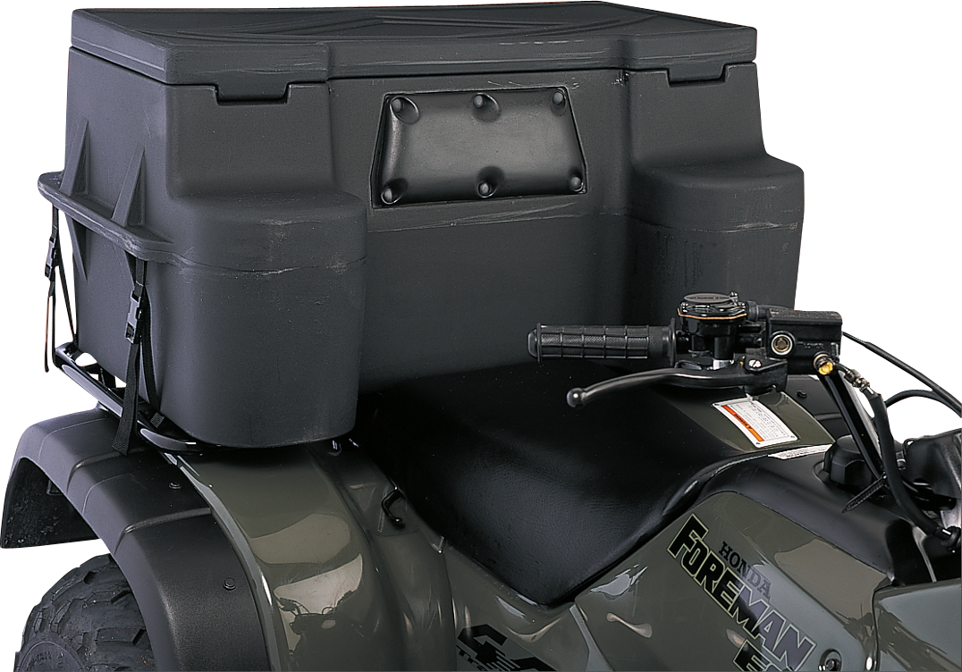 Close-up of a black Honda Foreman ATV showing the seat, handlebars, and a large, rugged black storage box mounted on the rear rack. The storage box has a reinforced rectangular panel and textured surface. No people are visible.