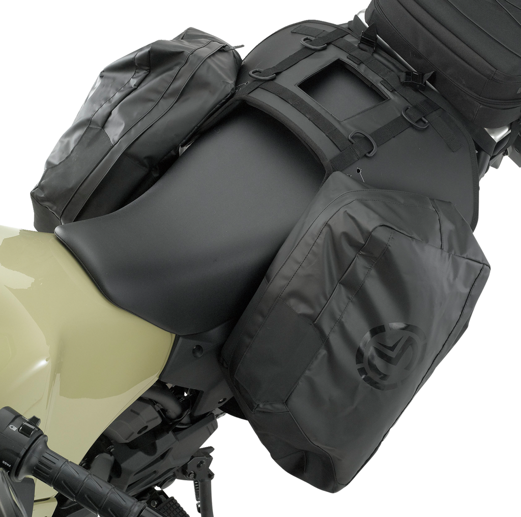 A close-up side view of a motorcycle with matte black saddlebags attached to both sides of the seat. The saddlebags are sleek, rectangular, and made of waterproof material with a subtle logo, securely fastened with straps. The bike is pale green and black