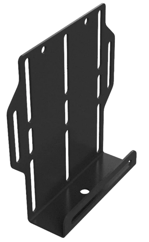 The SPARE TIRE MOUNT for Thumper Fab Ranger & Defender Ultimate Bed Rack (Black) features a black metal bracket with a vertical back plate with elongated slots and round holes, plus a flat base with a front lip for secure spare tire mounting.
