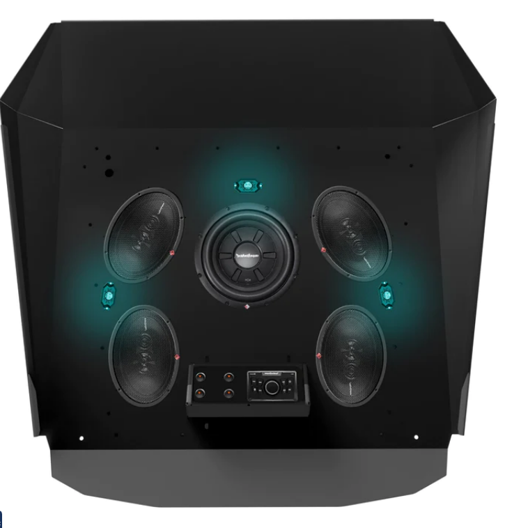 The Level 3 Roof for 2014+ Polaris RZR 900/1000/Turbo 2-Seat features angled sides, a matte black finish, blue accent lighting, five round speakers arranged symmetrically, and a central control panel with buttons and input ports.