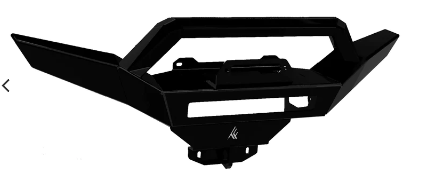 The 2018+ Can-Am Defender and Defender MAX Front Winch Bumper is a matte black, angular metal off-road bumper with a central rectangular cutout, side wings, reinforced mounts, and a small logo near the bottom center, shown isolated on white.