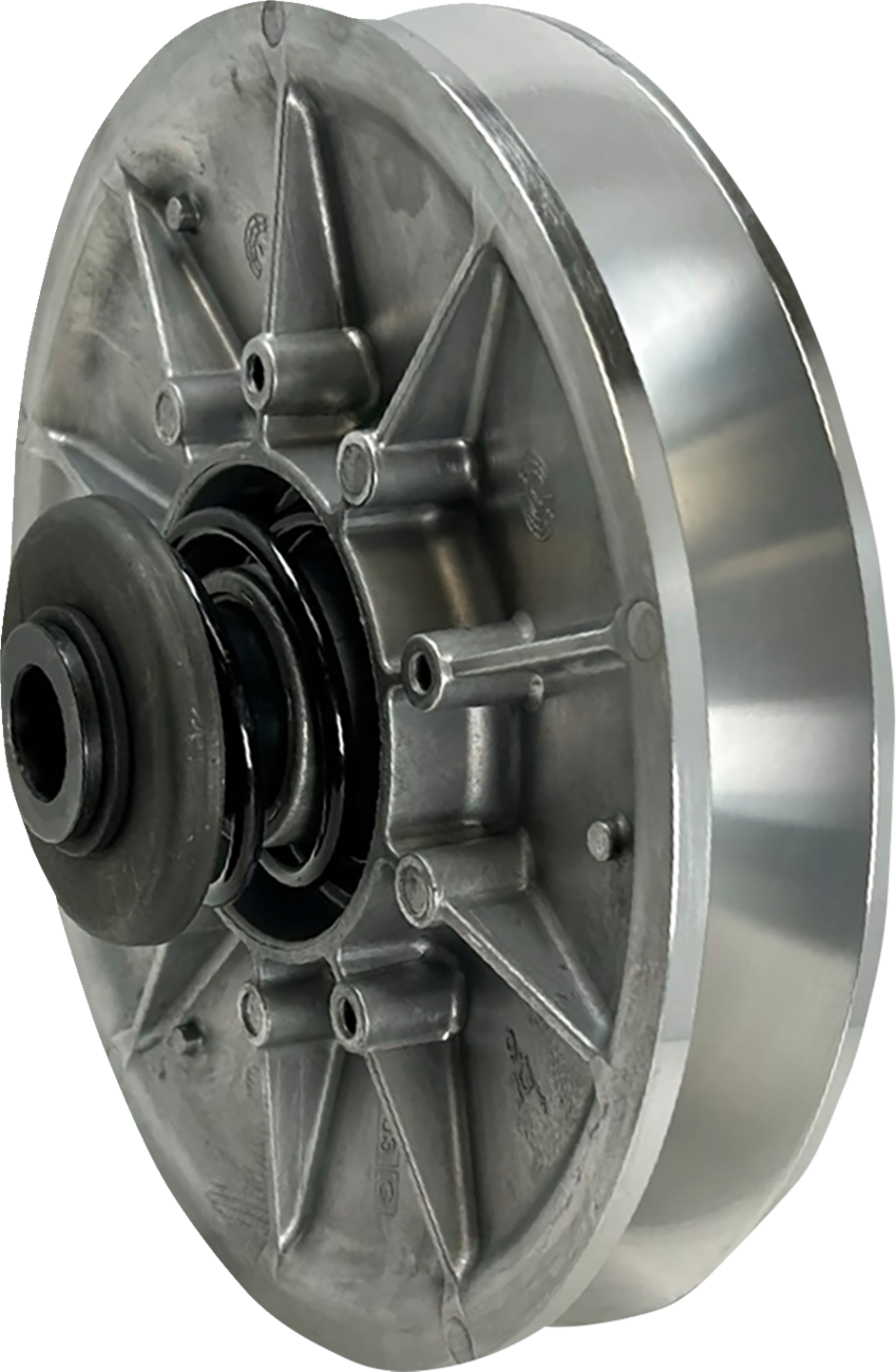 A close-up view of a metallic, circular mechanical component with a central black hub, radial spokes, and a shiny outer rim, possibly a clutch or pulley part for automotive or industrial machinery. The image is well-lit, showing its texture and details.