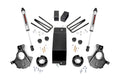 The 3.5 Inch Lift Kit | Cast Steel LCA | V2 for Chevy/GMC 1500 (14-18) is shown laid out on a white background, including shock absorbers, black knuckles, U-bolts, spacers, blocks, bolts, washers, nuts, and a central metal plate.