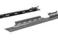 The image shows two black Ranger 1500 XD Nerf Rails with flanged edges, elongated slots, and angled brackets on a white background—designed for mounting or supporting equipment in a rack or shelving system.