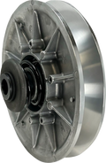 A close-up view of a metallic machine part, likely a pulley or clutch component, featuring a circular, ribbed design with a central hub and a spring mechanism, made of shiny silver metal with visible bolts and structural spokes.
