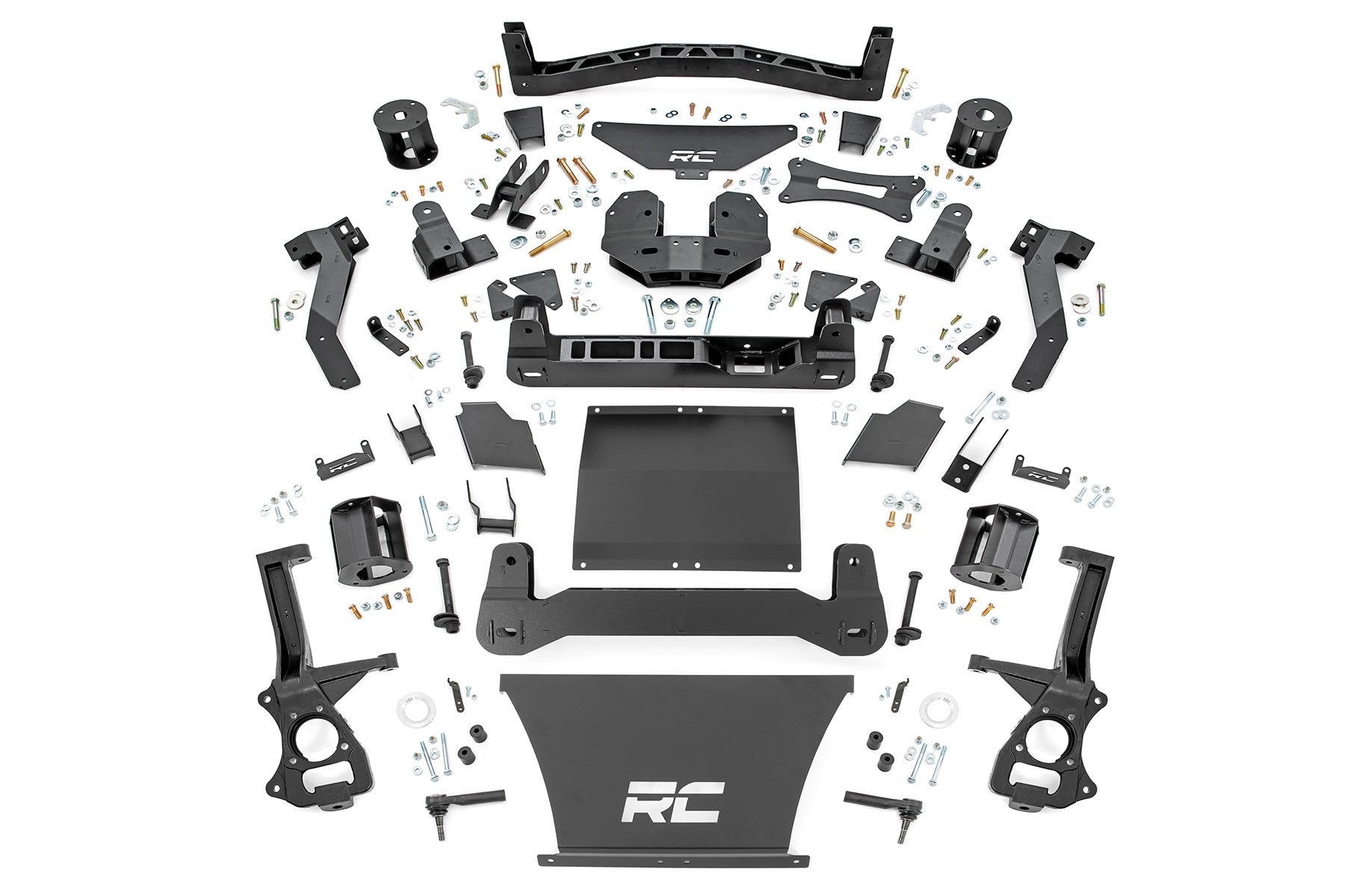 Flat lay of a 6 Inch Lift Kit for Chevy/GMC Tahoe/Yukon 4WD (2021-2024) showing black metal brackets, RC-labeled plates, bolts, nuts, washers, spacers, and mounting hardware neatly organized on a white background.