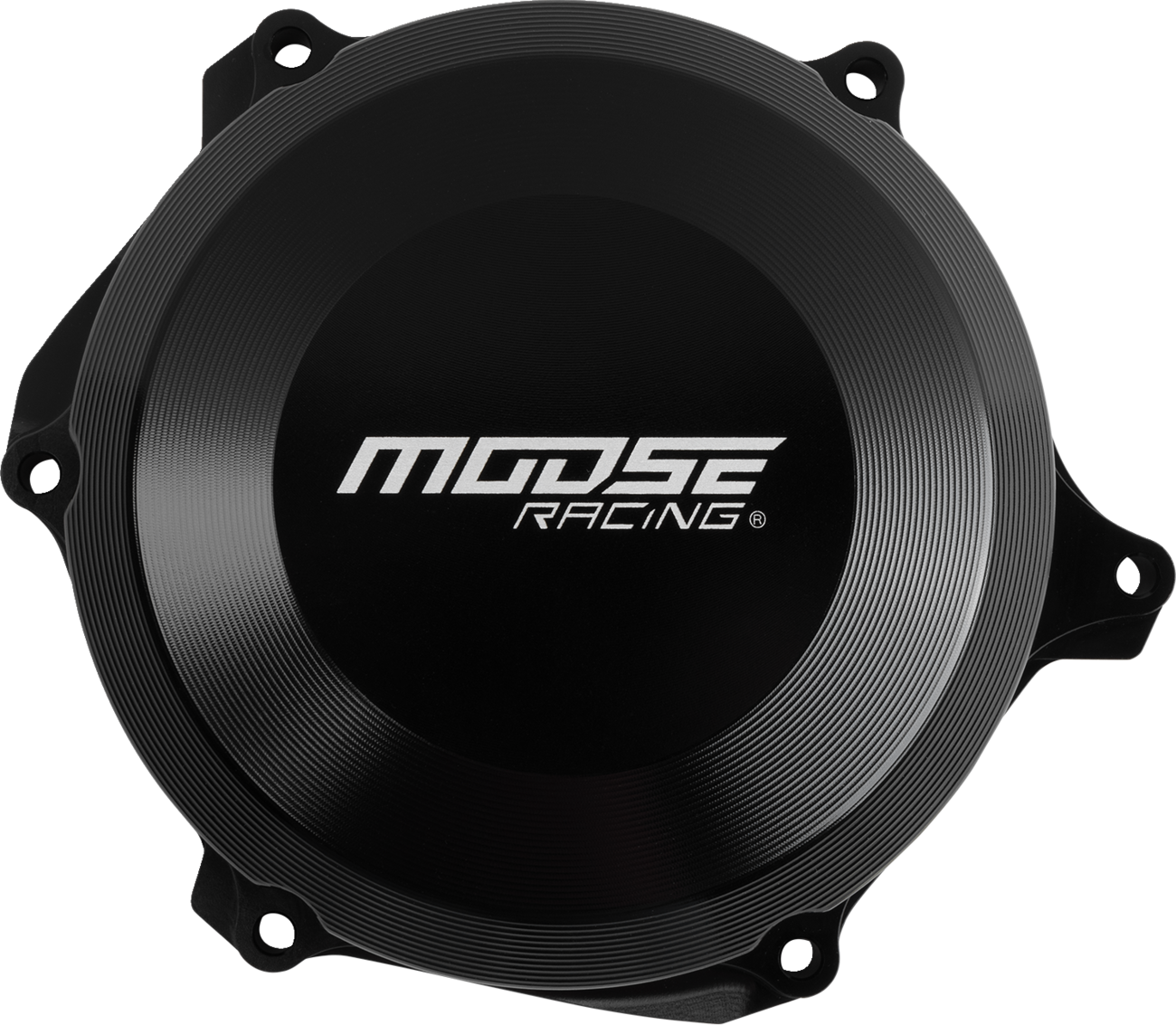 A round, black motorcycle engine cover with the text MOOSE RACING in bold white letters at the center. The metal cover has a ridged, circular pattern and four mounting holes around the edges. The background is plain and light-colored.