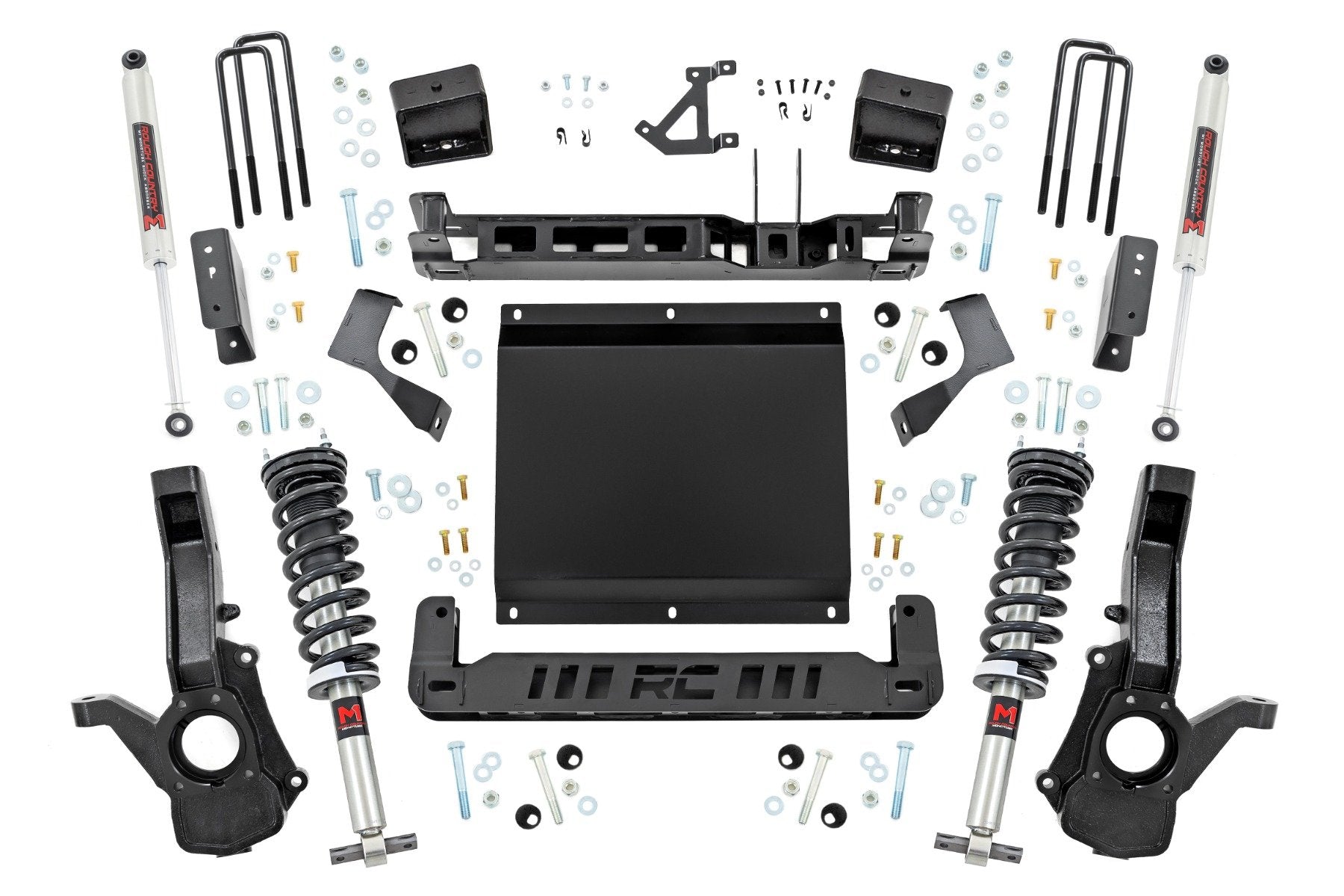 A 6 Inch Lift Kit with M1 Struts for Chevy/GMC Canyon/Colorado 4WD (2023-2024) is displayed on a white background, showing all parts—black brackets, coilovers, shocks, U-bolts, spacers—with the “RC” cutout mounting plate arranged symmetrically.