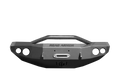 A textured black 2000-2007 GMC 2500 Stealth Front Winch Bumper with Pre-Runner Guard, central winch cutout, circular side holes, raised protective bar, and the “ROAD ARMOR” logo above a shield emblem; fits Warn M12000/Smittybilt XRC.
