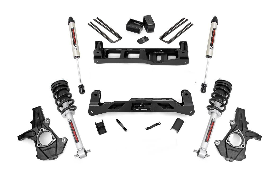 The 7.5 Inch Lift Kit | N3 Struts/V2 for Chevy/GMC 1500 (07-13) includes black and silver shock absorbers, strut assemblies, crossmembers, spindles, U-bolts, and mounting brackets arranged on a white background.