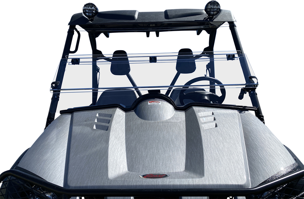 Front view of a gray off-road utility vehicle with a split windshield, two seats, a steering wheel, roof lights, and protective side netting. The background is removed and white, highlighting the vehicle’s details and structure.