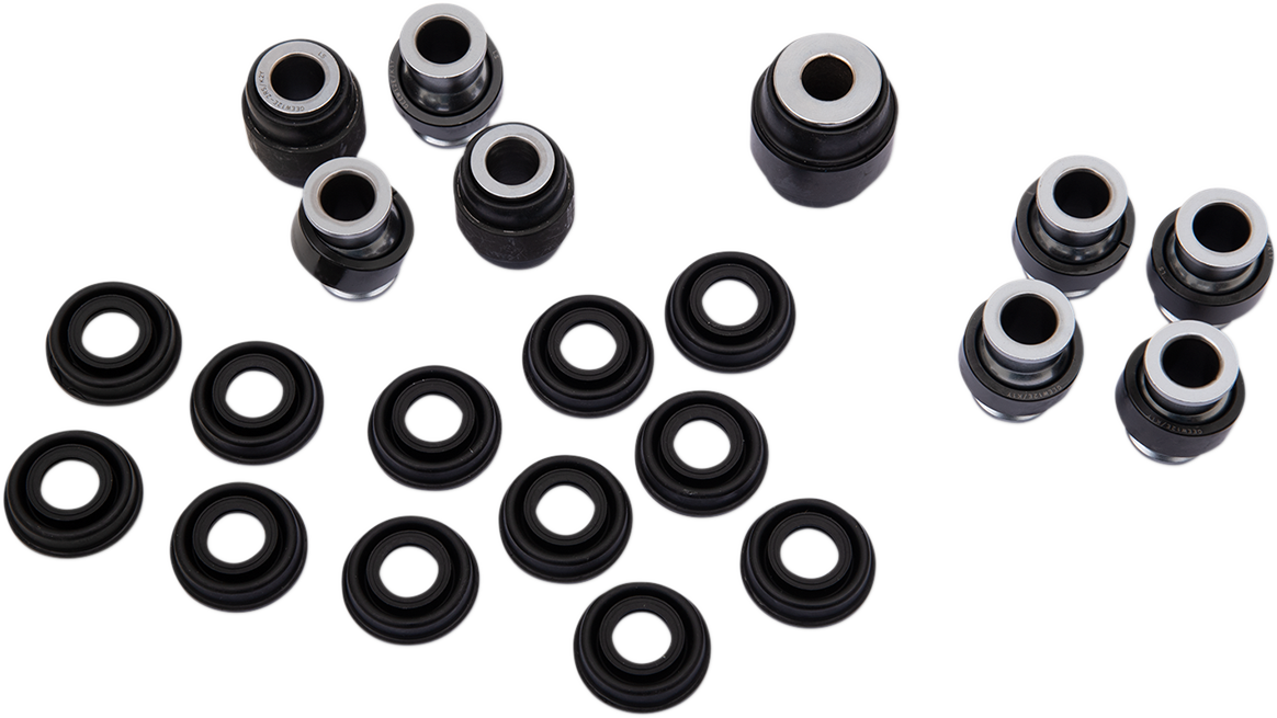 A set of black and silver metal bushings and matching circular rubber seals are arranged on a white background. The components are grouped, showing different sizes and pairs, likely for automotive or mechanical assembly.