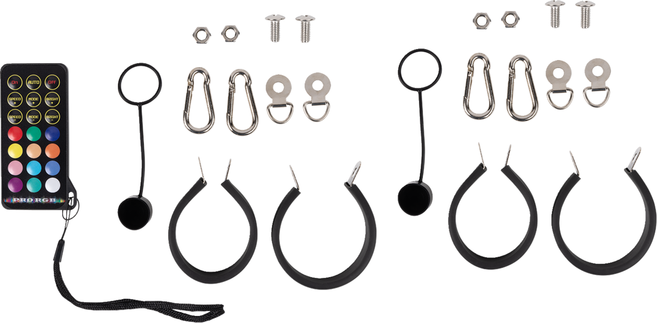 A set of LED rock light accessories, including a remote control, four black rubber mounting rings, screws, nuts, washers, metal brackets, carabiner clips, and wiring hardware, all laid out neatly on a white background.