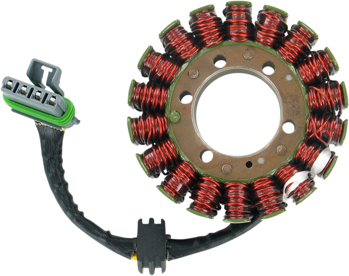 A circular metal stator with multiple coils of copper wire, a black insulated cable attached, ending in a gray and green electrical connector. The stator has a large central hole and smaller holes surrounding it, used in electric motors or generators.