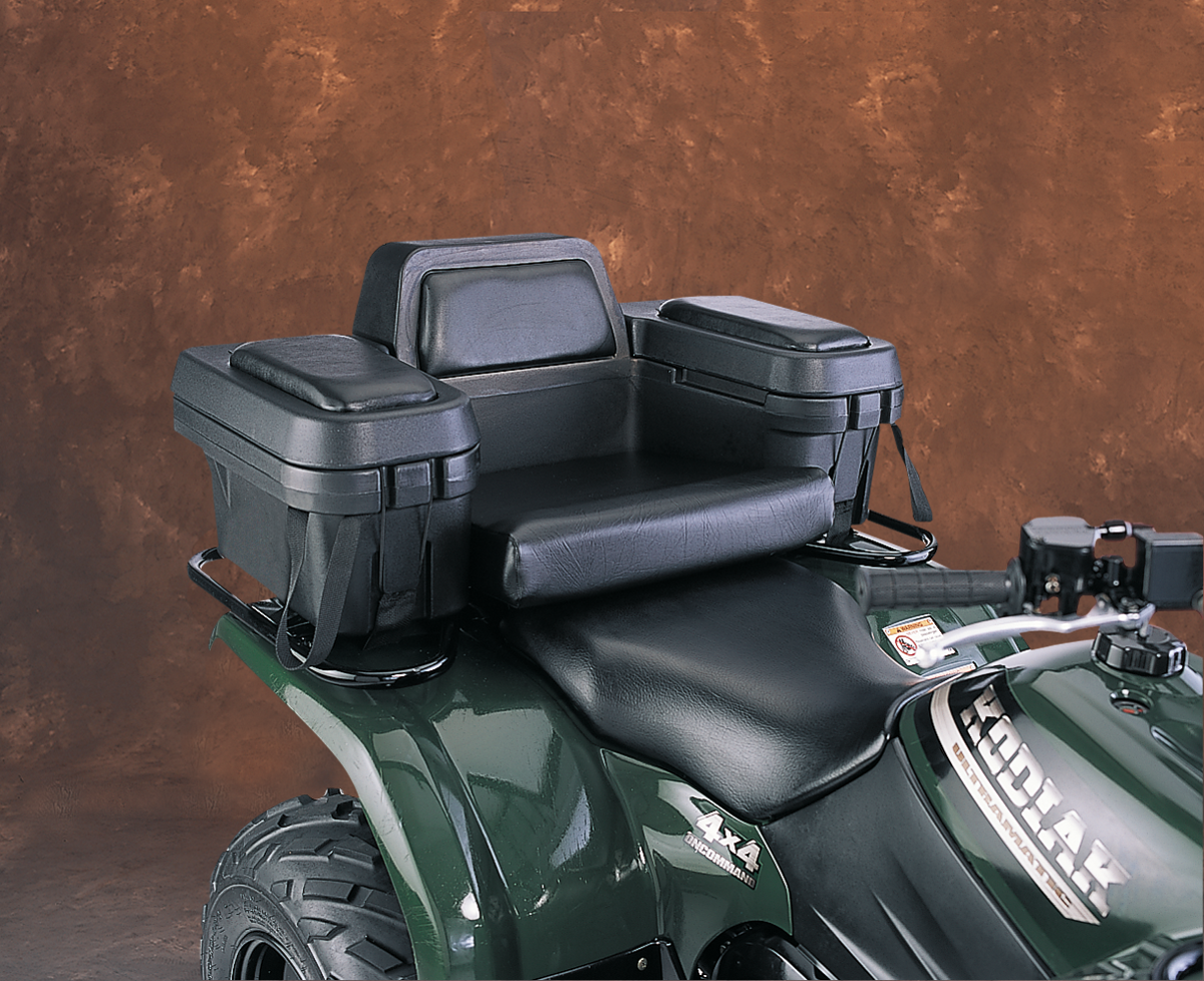 A black padded cargo seat with armrests and storage compartments is mounted on the back of a dark green four-wheeler ATV, set against a brown textured studio background. The seat and compartments are designed for added passenger comfort and utility.