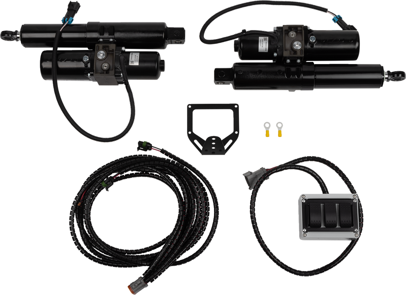 Two black linear actuators with cables, a coiled wiring harness, a metal mounting bracket, two ring terminals, and a rectangular control switch box with two switches are arranged neatly on a white background.