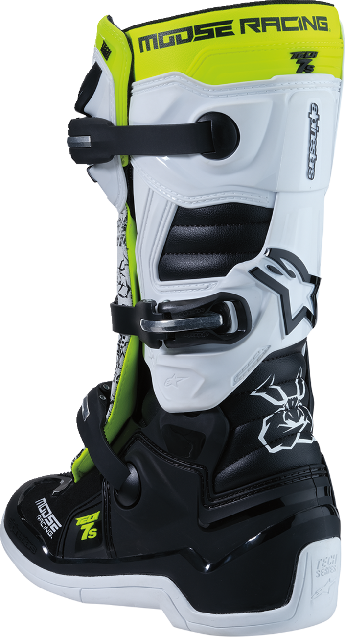 A motocross boot featuring black, white, and neon yellow colors. The boot displays logos such as Moose Racing and Alpinestars, multiple buckles and straps for fastening, and a graphic of a moose head on the lower side.