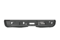 A textured black 2008-2014 Chevy/GMC 2500 Stealth rear winch bumper features rugged, angular steel with a central winch cutout (fits Warn M8000 or 9.5XP), multiple mounting holes, and “ROAD ARMOR” in white on the right side.