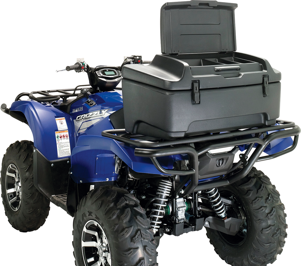 A blue Yamaha Grizzly ATV with rugged tires is pictured from the rear angle. On its back rack is a large, black, hard plastic storage box with the lid open, showing ample interior space for carrying gear.