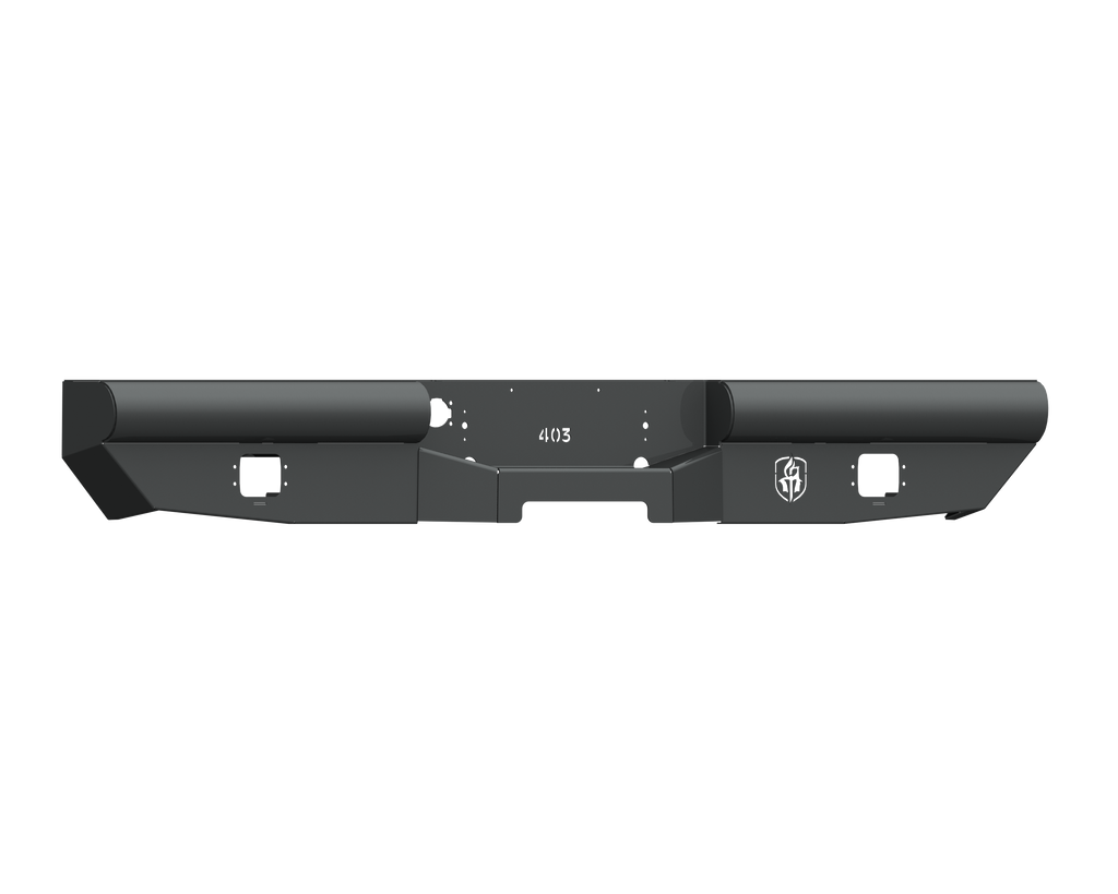 The 2003-2009 Ram 2500 Vaquero Rear Non-Winch Bumper in texture black features a rectangular center cutout, two square side cutouts, and a right-side etched logo, with smooth angular lines for a clean, modern industrial look.