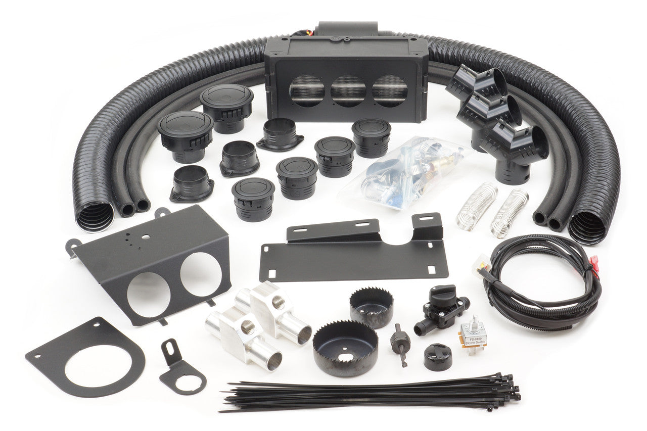 A range of installation parts for the Can-Am Maverick X3 (2018-2024) - Ice Crusher Cab Heater is shown, including black hoses, vents, brackets, couplers, clamps, wiring harness, mounting plates, connectors, fittings, screws, zip ties, drill bits and hardw