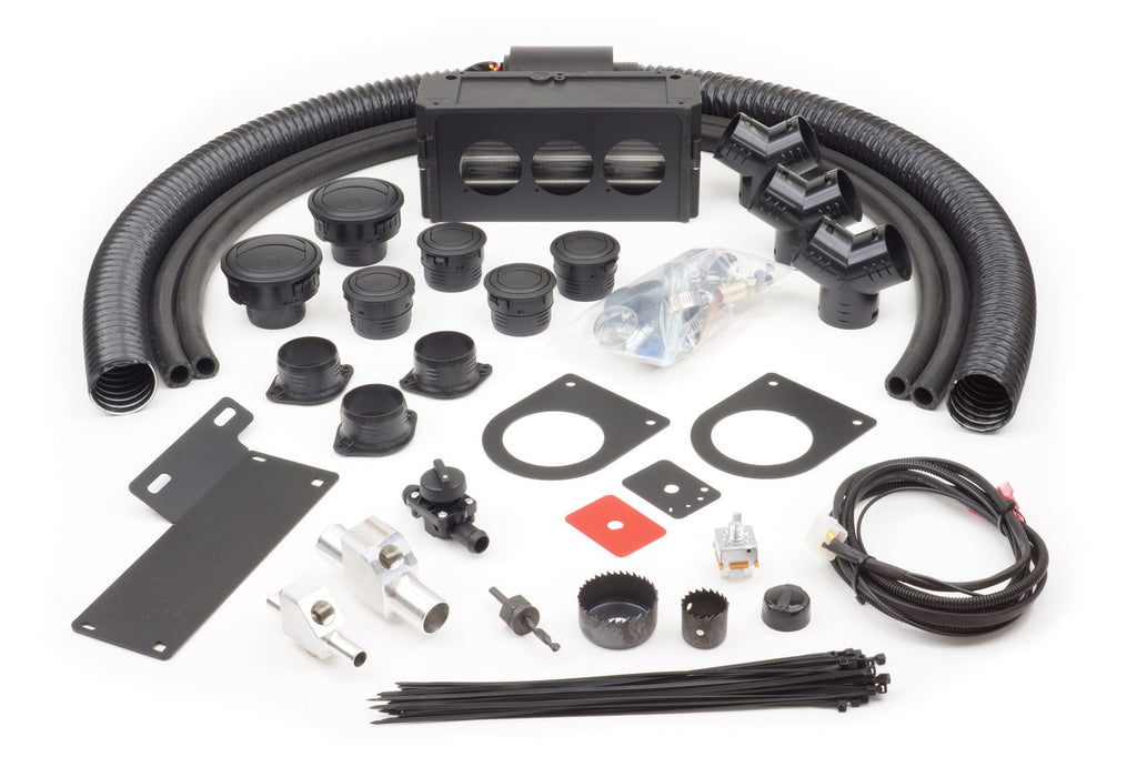 The Polaris Ranger XP900/900 (2013-2020) Ice Crusher Cab Heater kit includes black hoses, plastic vents, metal brackets, circular fittings, mounting hardware, zip ties, cables, connectors, gaskets, and a rectangular blower unit arranged on a white backgro