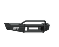 The 2006-2009 Ram 2500 Vaquero Front Non-Winch Bumper Pre-Runner Guard in textured black features a central rectangular cutout, side mesh vents, mounting points, an angular design, and a sturdy tubular center bar. Background is transparent.