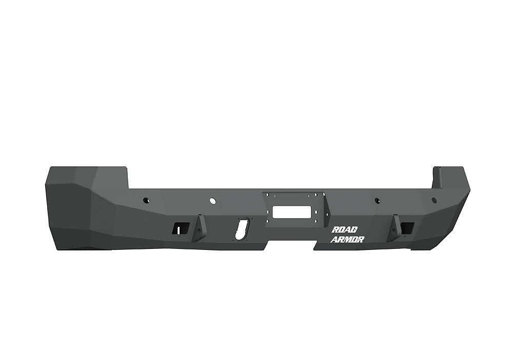 The 2010-2018 Ram 2500 Stealth Rear Winch Bumper (Texture Black, fits Warn M8000) features angular edges, sensor holes, accessory cutouts, and the ROAD ARMOR logo in white on the right. The heavy-duty bumper is shown on a plain white background.