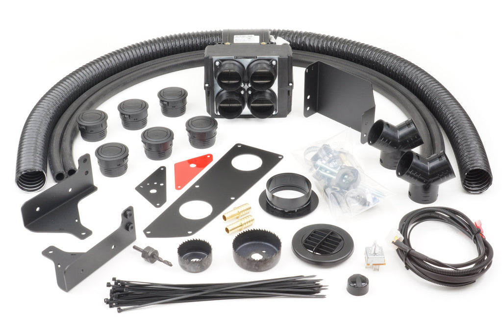 The Honda Talon (2019-2024) Ice Crusher Cab Heater kit is displayed on a white background with hoses, a vent box, black vents, metal brackets, wiring harness, zip ties, connectors, hose clamps, hole saws, and a small hardware bag.