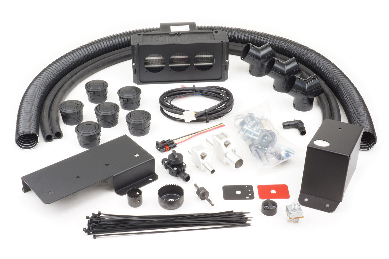 The Polaris RZR Pro XP | Pro R | Turbo R (2019-2024) Ice Crusher UTV Cab Heater with Defrost includes black flexible hoses, a rectangular vent box, assorted fittings, wiring harness, brackets, switches, zip ties, screws, and hardware.