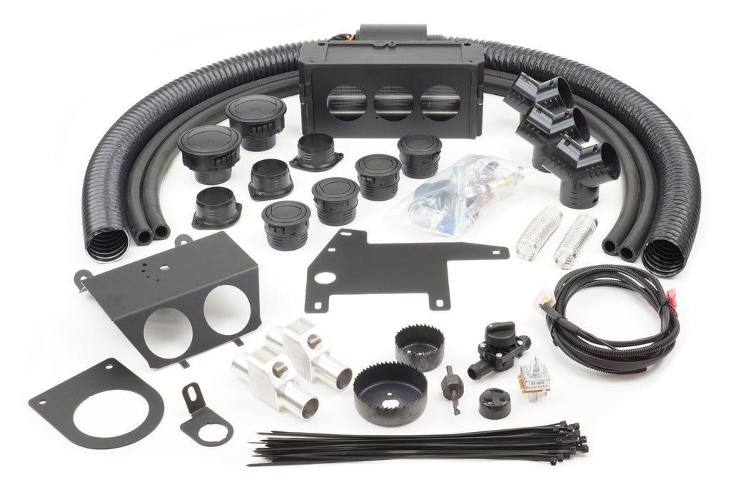 The Can-Am Maverick X3 (2017) - Ice Crusher Cab Heater kit is displayed, featuring flexible hoses, vent covers, brackets, saw bits, cables, connectors, switches, zip ties, and various hardware pieces on a white background.