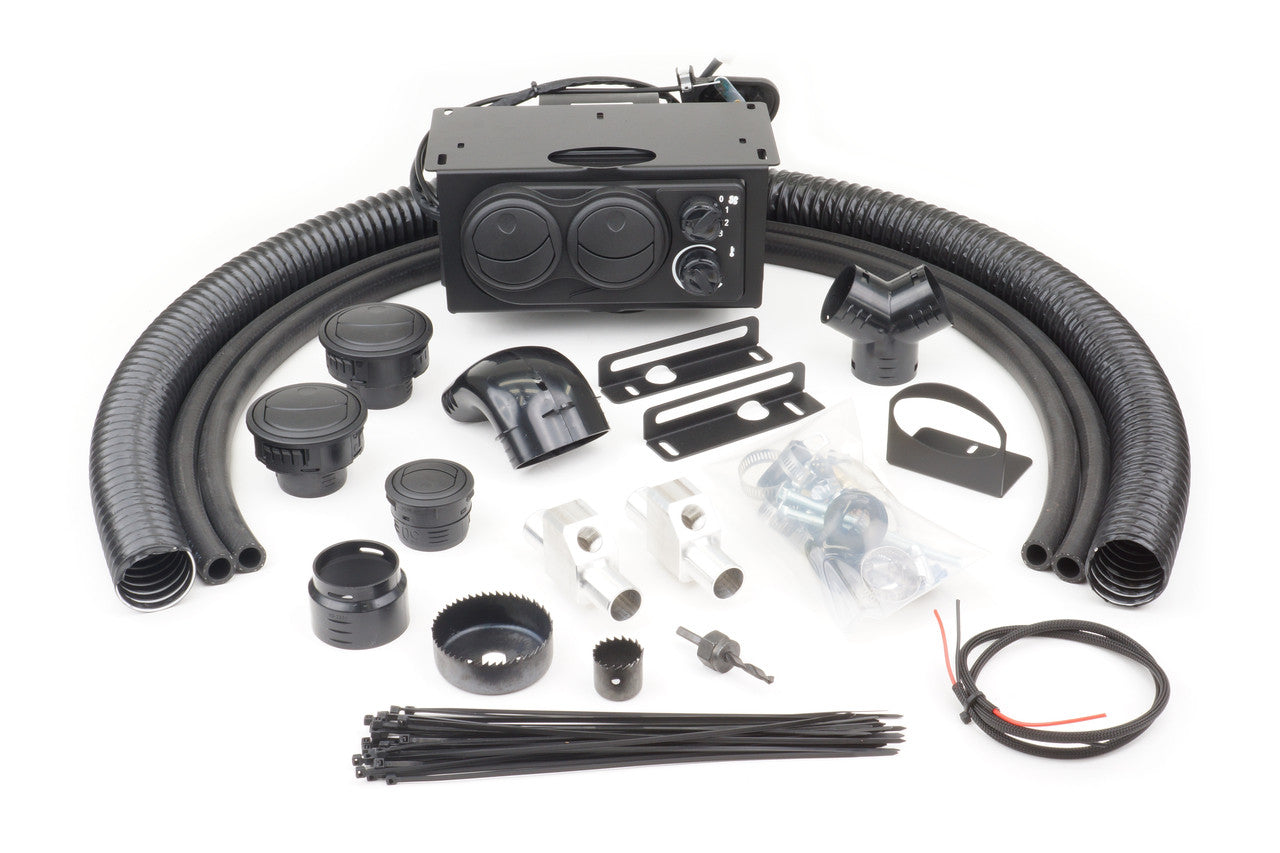 The Polaris RZR 570 (2012-2021) / RZR 800 (2008-2014) Ice Crusher Cab Heater kit for models without electric power steering includes a heater unit, hoses, connectors, brackets, zip ties, wiring, drill bit, hose clamps, and hardware.