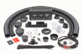 The Honda Pioneer 500/520 (2015-2022) Ice Crusher Cab Heater kit includes black flexible ducts, vents and connectors, metal brackets, a rectangular housing unit, zip ties, wiring harness, cable connectors, mounts, and small hardware components.