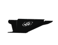 The 2019+ Ram 1500 Spartan Front Bumper Bolt-On Accessory Skid Plate Guard by Road Armor features a textured black finish, angular edges, a flame logo cutout, and multiple bolt holes, shown against a solid black background.