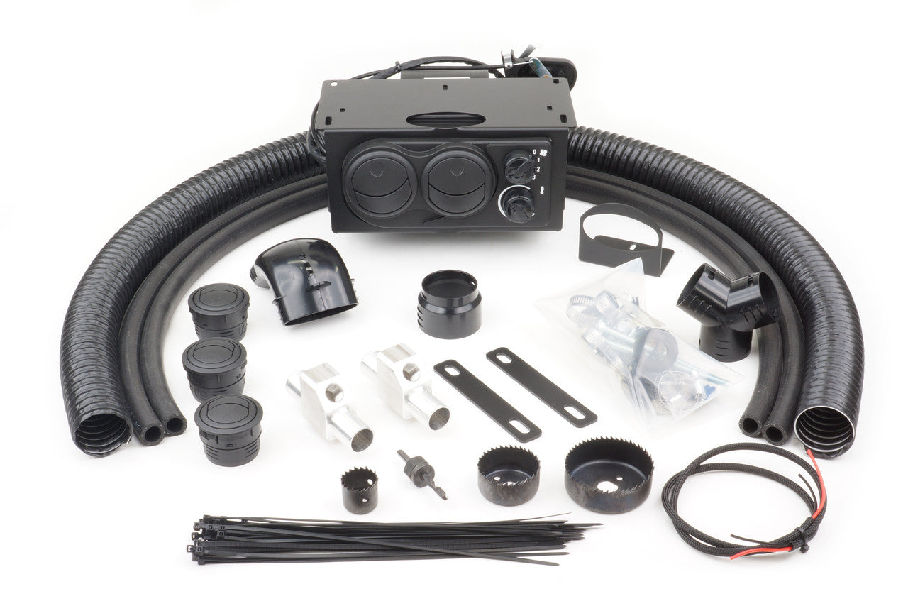 The Polaris Ranger Midsize 400/500/570/800 (2010-2014) Ice Crusher Cab Heater kit is displayed on a white background, featuring hoses, the heater unit, vents, connectors, wiring, brackets, fasteners, zip ties, and other hardware arranged neatly.