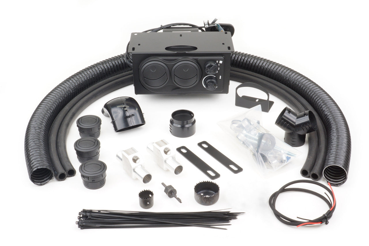 The Kawasaki Teryx 750 (2008-2013) Ice Crusher Cab Heater is displayed on a white background with hoses, vents, main control unit with dials, brackets, connectors, wiring, zip ties, screws, cutting bits, and installation hardware.
