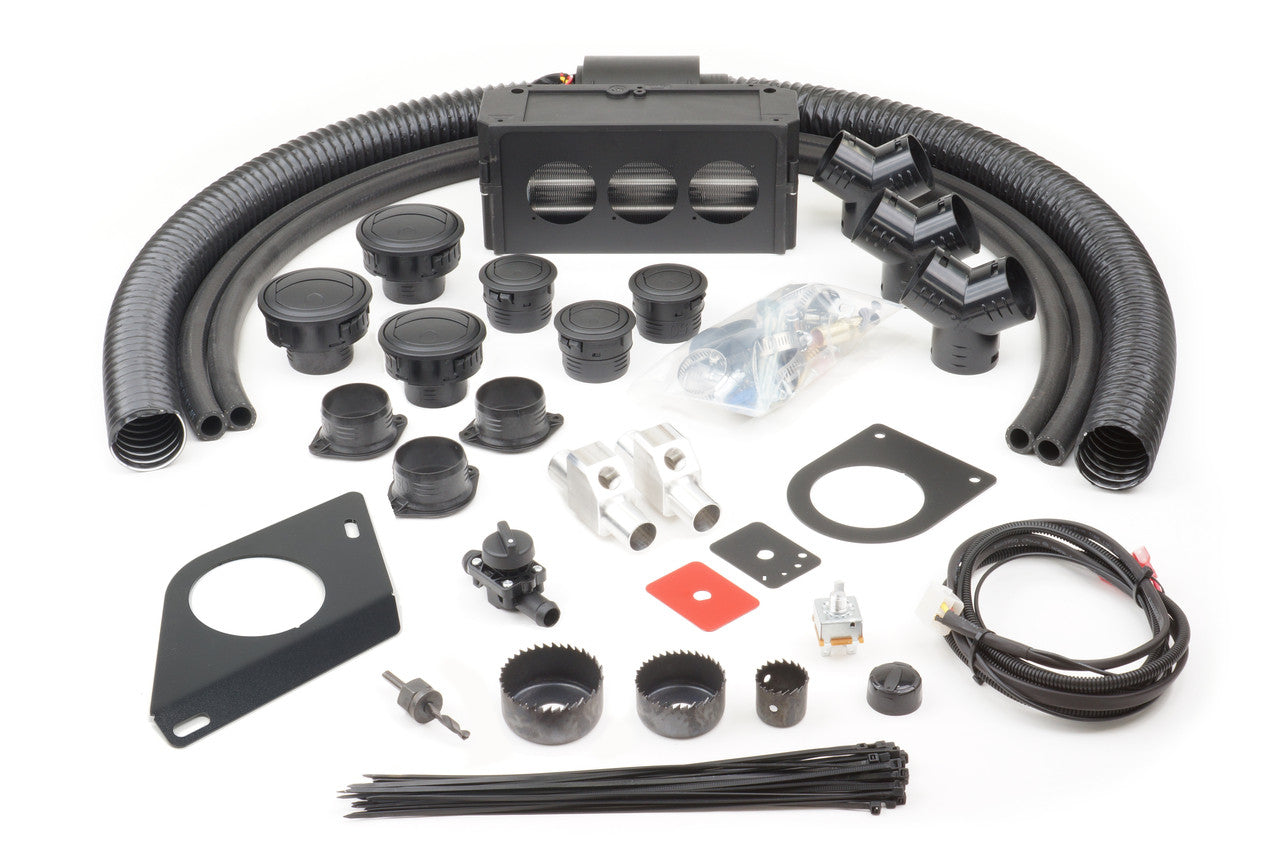The Arctic Cat Prowler/HDX (2015-2017) Ice Crusher Cab Heater kit includes hoses, vents, brackets, switches, wiring, grommets, zip ties, fittings, hole saws, and mounting plates—all organized on a white background.