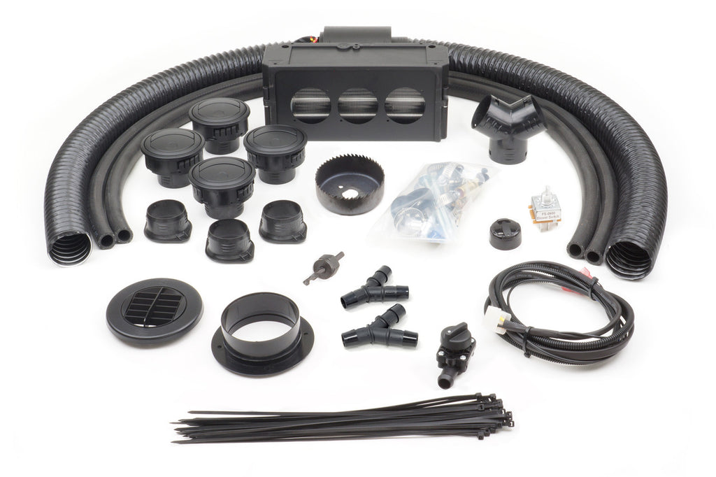 The Kawasaki Mule Pro FXT Rear (2015-2021) - Ice Crusher Cab Heater kit is shown on a white background, featuring neatly arranged hoses, vents, connectors, wiring, zip ties, screws, and a black metal air distribution unit.