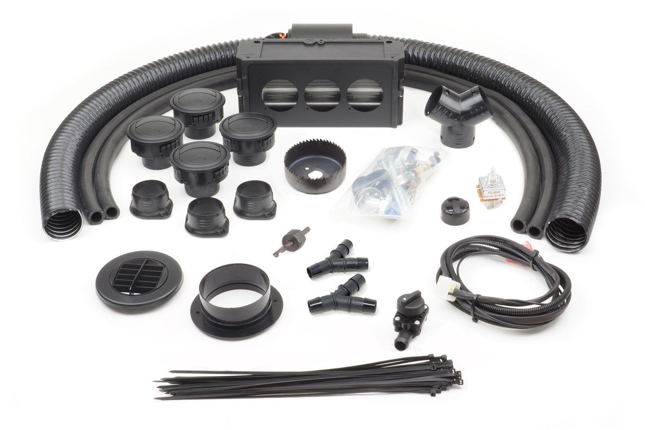 The Kawasaki Mule Pro FXT Rear (2015-2021) - Ice Crusher Cab Heater kit is shown on a white background, featuring neatly arranged hoses, vents, connectors, wiring, zip ties, screws, and a black metal air distribution unit.