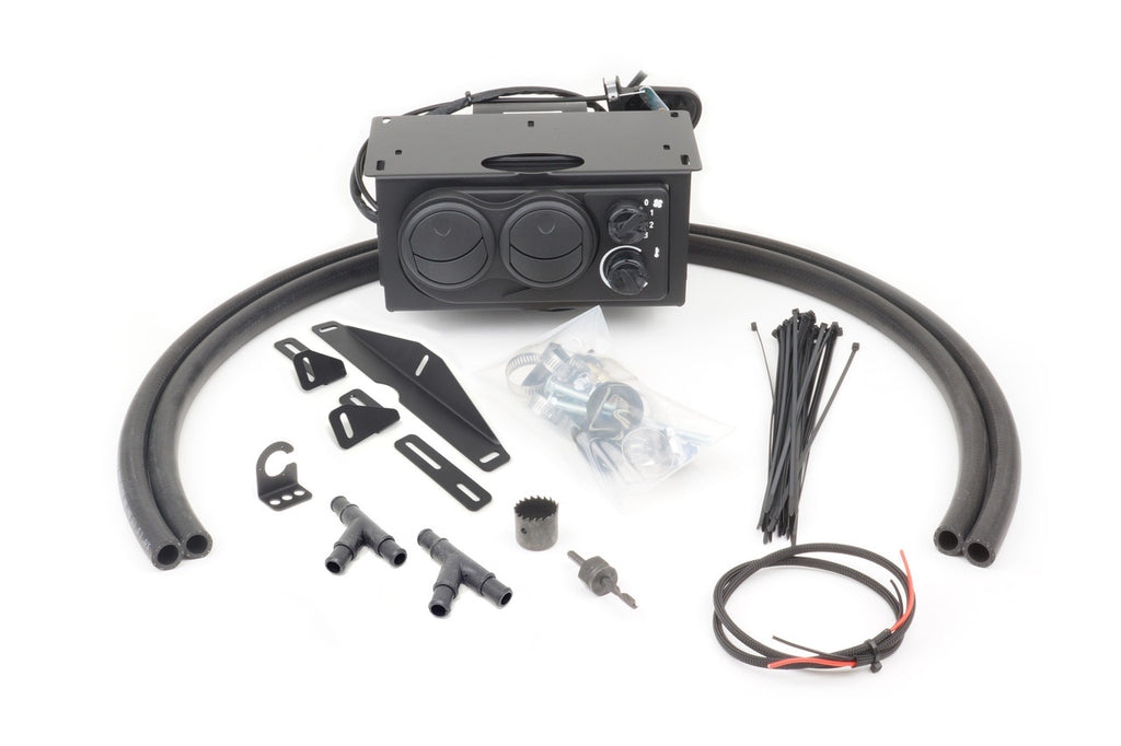 The Kubota RTV900 (2004-2011) Ice Crusher Cab Heater kit is displayed on a white background, featuring a black heater unit with vents and knobs, mounting brackets, hoses, T-fittings, screws, a hole saw, wire ties, wiring, and hardware.