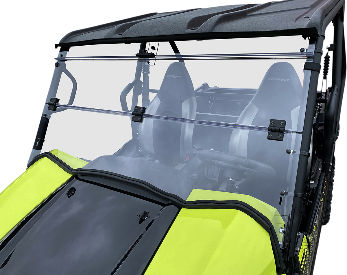 A close-up of a utility task vehicle (UTV) with a clear, two-piece windshield and a black roof. The vehicle is lime green, and two black seats are visible inside. The photo highlights the windshield and interior seating.