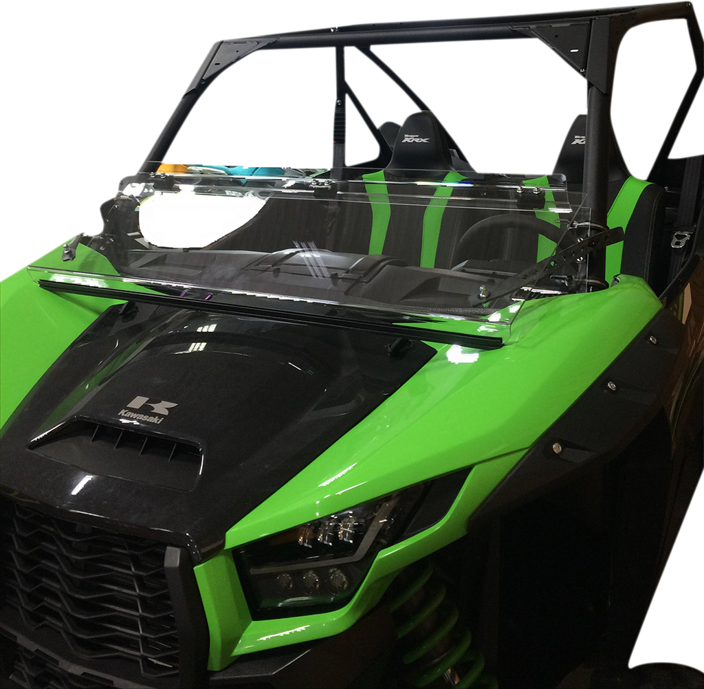 A green and black off-road utility vehicle with a partial windshield, open top, and two seats. The front features angular headlights, a black grille, and visible suspension springs beneath the hood. The background is white.