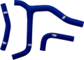 Four blue silicone hoses of varying shapes and sizes, each with a white SAMCO SPORT logo, are arranged on a plain white background. The hoses include a Y-shaped piece, two bent hoses, and one straight hose.